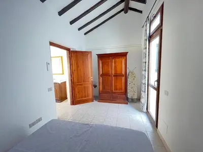 Letto o letti in una camera di Appartamento Nassia 1 By La Via Del Mare Viaggi e Vacanze