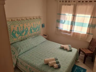 Letto o letti in una camera di Casa Alessandro