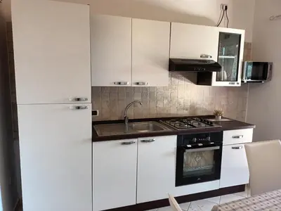 Cucina o angolo cottura di La CASA del CUORE PULA