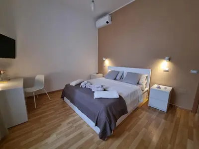 Letto o letti in una camera di Sa domu de su beciu