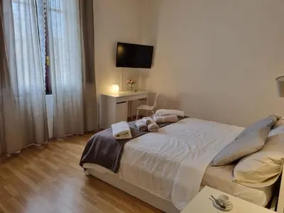 Letto o letti in una camera di Sa domu de su beciu