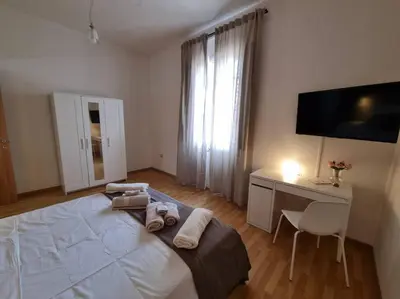 Letto o letti in una camera di Sa domu de su beciu