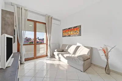 TV o dispositivi per l'intrattenimento presso CagliariParadiseApartament Waves