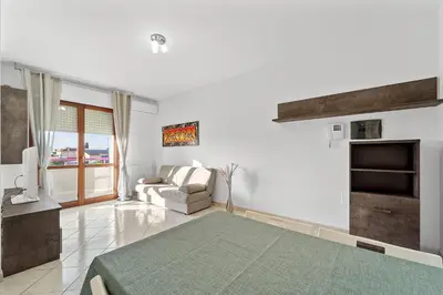 Cucina o angolo cottura di CagliariParadiseApartament Waves