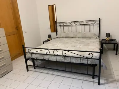 Letto o letti in una camera di Zeus