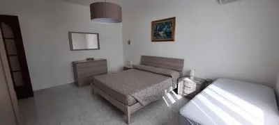 Letto o letti in una camera di Casa vacanze I gemelli