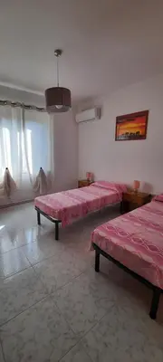 Letto o letti in una camera di Casa vacanze I gemelli
