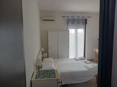 Letto o letti in una camera di Le Porte del Sole