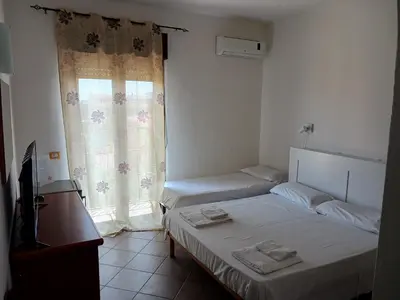Letto o letti in una camera di Le Porte del Sole