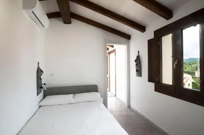 Letto o letti in una camera di Casa tipica nel borgo antico