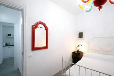 Letto o letti in una camera di Casa tipica nel borgo antico
