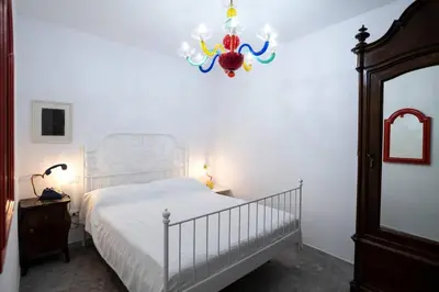 Letto o letti in una camera di Casa tipica nel borgo antico