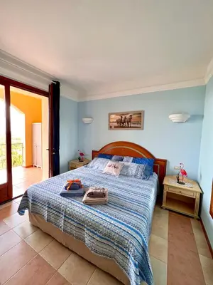 Letto o letti in una camera di Appartamento I Fenicotteri - Pula