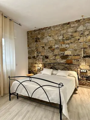 Letto o letti in una camera di Da nonna Amelia