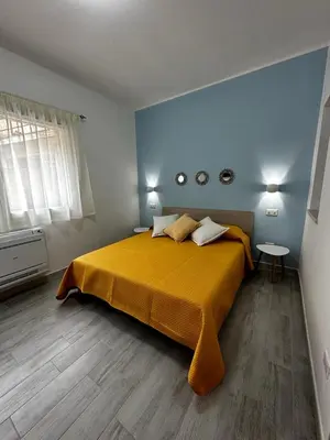 Letto o letti in una camera di Da nonna Amelia