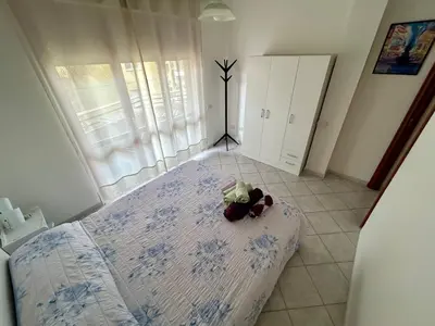 Letto o letti in una camera di Apartment with private parking spot in Oristano's city center