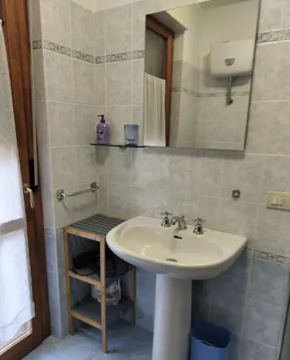 Bagno di Apartment with private parking spot in Oristano's city center
