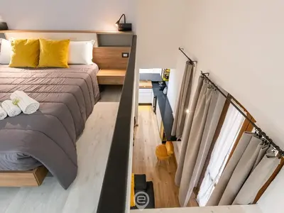 Letto o letti in una camera di Modern Gem in Castello