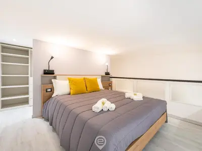 Letto o letti in una camera di Modern Gem in Castello