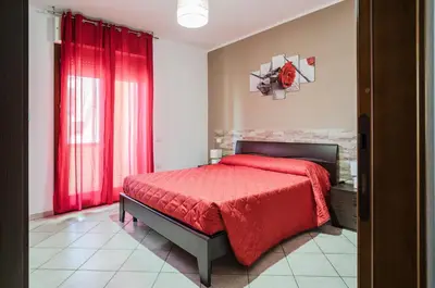 Letto o letti in una camera di GuestHost - Sestu Lovely Apt W Balcony near Spiaggia Poetto!