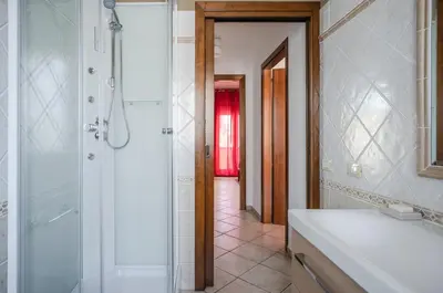 Bagno di GuestHost - Sestu Lovely Apt W Balcony near Spiaggia Poetto!