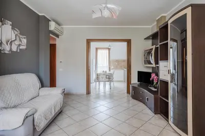 TV o dispositivi per l'intrattenimento presso GuestHost - Sestu Lovely Apt W Balcony near Spiaggia Poetto!