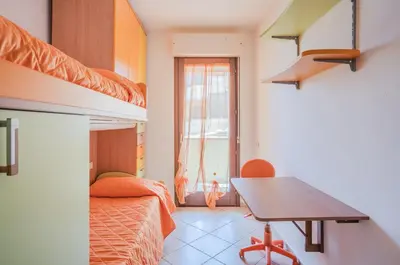 Letto o letti in una camera di GuestHost - Sestu Lovely Apt W Balcony near Spiaggia Poetto!