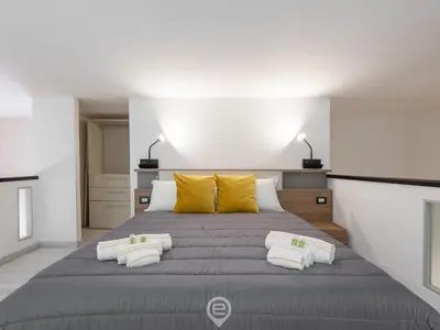 Letto o letti in una camera di Castello Loft Heaven