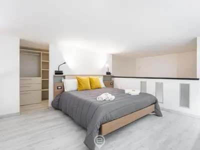Letto o letti in una camera di Castello Loft Heaven