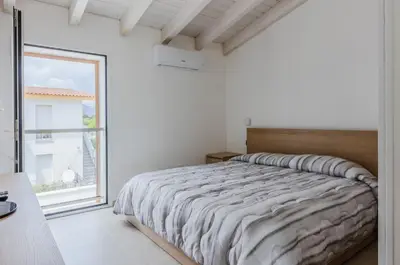 Letto o letti in una camera di GuestHost - Pula Comfy Apartment w Private Parking