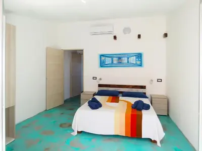 Letto o letti in una camera di Panohome