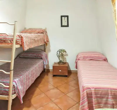 Letto o letti in una camera di Charming Apartment in Cardedu - 70 m² - Shared Pool
