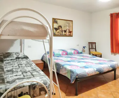 Letto o letti in una camera di Charming Apartment in Cardedu - 70 m² - Shared Pool