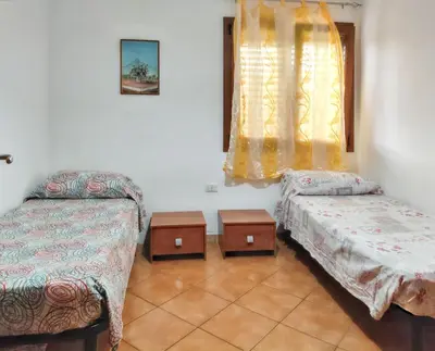 Letto o letti in una camera di Charming Apartment in Cardedu - 70 m² - Shared Pool