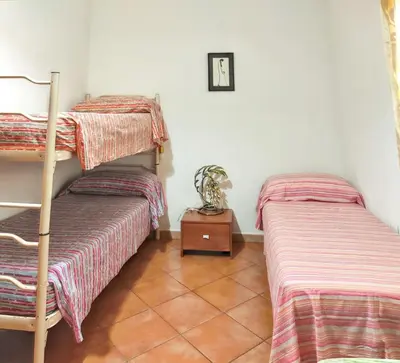 Letto o letti in una camera di Charming Apartment in Cardedu - 70 m² - Shared Pool