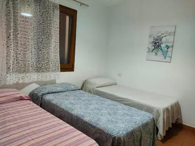Letto o letti in una camera di Modern Apartment with Pool near Cardedu - 85 sqm