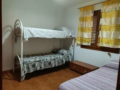 Letto o letti in una camera di Modern Apartment with Pool near Cardedu - 85 sqm