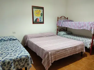 Letto o letti in una camera di Modern Apartment with Pool near Cardedu - 85 sqm