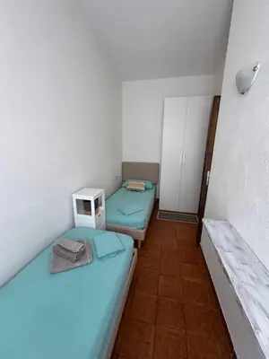 Letto o letti in una camera di Domu Mea 1 min a Piedi dal Mare
