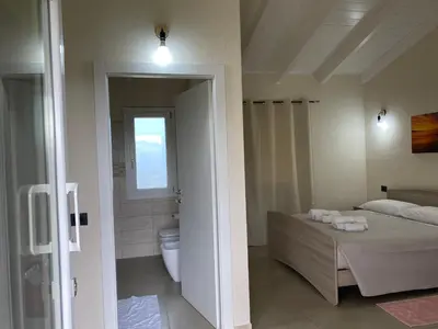 Letto o letti in una camera di Is Arenas Biancas Agriturismo