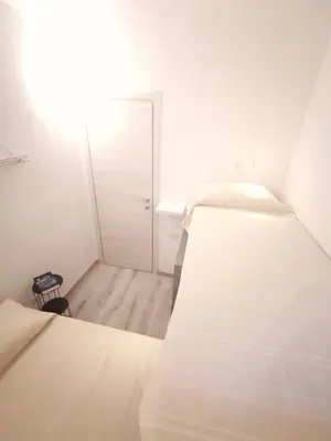 Letto o letti in una camera di Appartamento due passi dal mare
