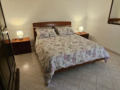 Letto o letti in una camera di Valery House