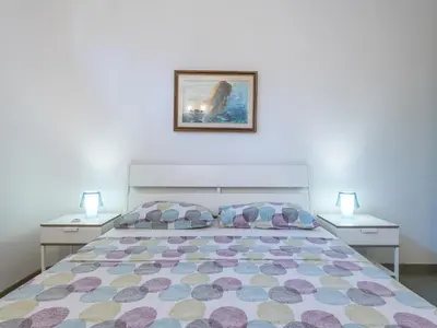 Letto o letti in una camera di Sardinia SPA Apartment