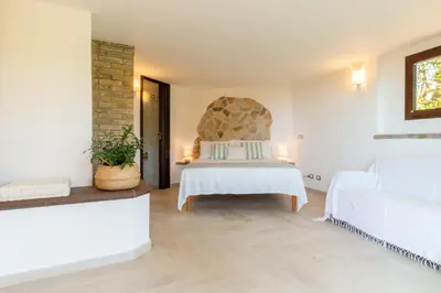 Letto o letti in una camera di Villa Campigiana
