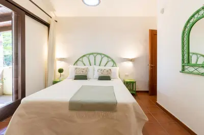 Letto o letti in una camera di Villa Campigiana