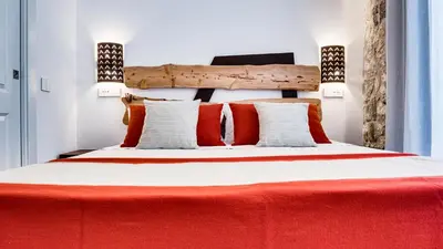 Letto o letti in una camera di Kalista