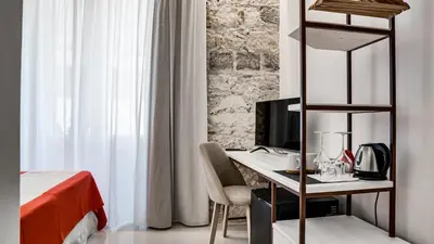 Letto o letti in una camera di Kalista
