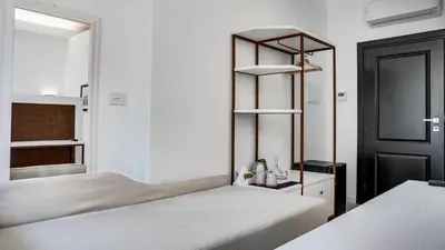 Letto o letti in una camera di Kalista