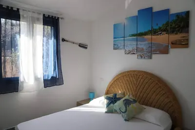 Letto o letti in una camera di Villetta Il Faro sul Mare