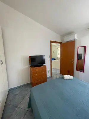 TV o dispositivi per l'intrattenimento presso La Pavoncella - Appartamento a 800 mt dalla spiaggia